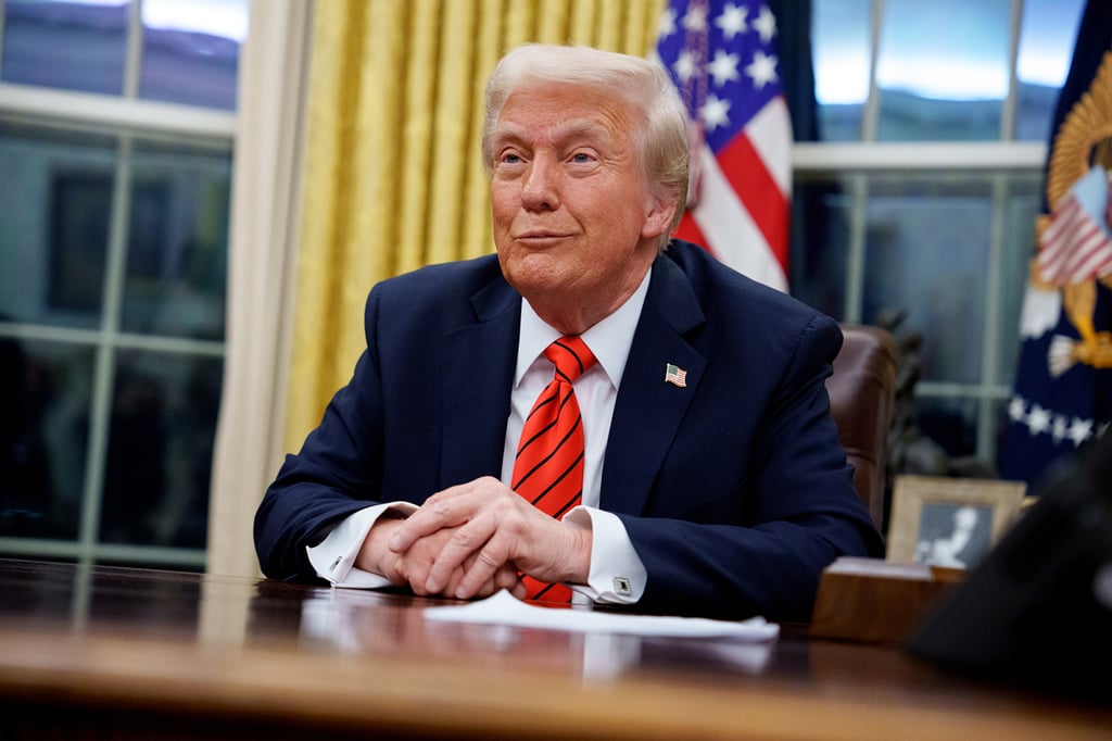 US President Donald Trump on Monday after signing a series of executive orders, including one for 25 per cent tariffs on steel and aluminium imports. Photo: Getty Images/TNS US President Donald Trump on Monday after signing a series of executive orders, including one for 25 per cent tariffs on steel and aluminium imports. Photo: Getty Images/TNS