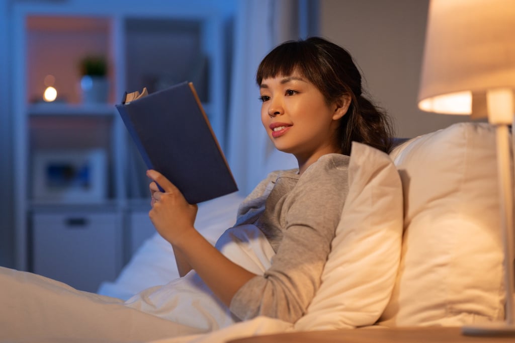 If you find yourself awake in bed, give yourself time to drop back off. If you still can’t sleep, get up and do something relaxing: watch a favourite series or read a book. Photo: Shutterstock