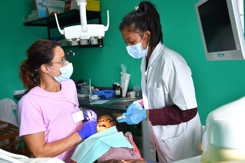 Volunteer dentists and Malagasy dental care professionals treat patients during the Modern Dental Care Foundation’s seventh mission to Madagascar last October.