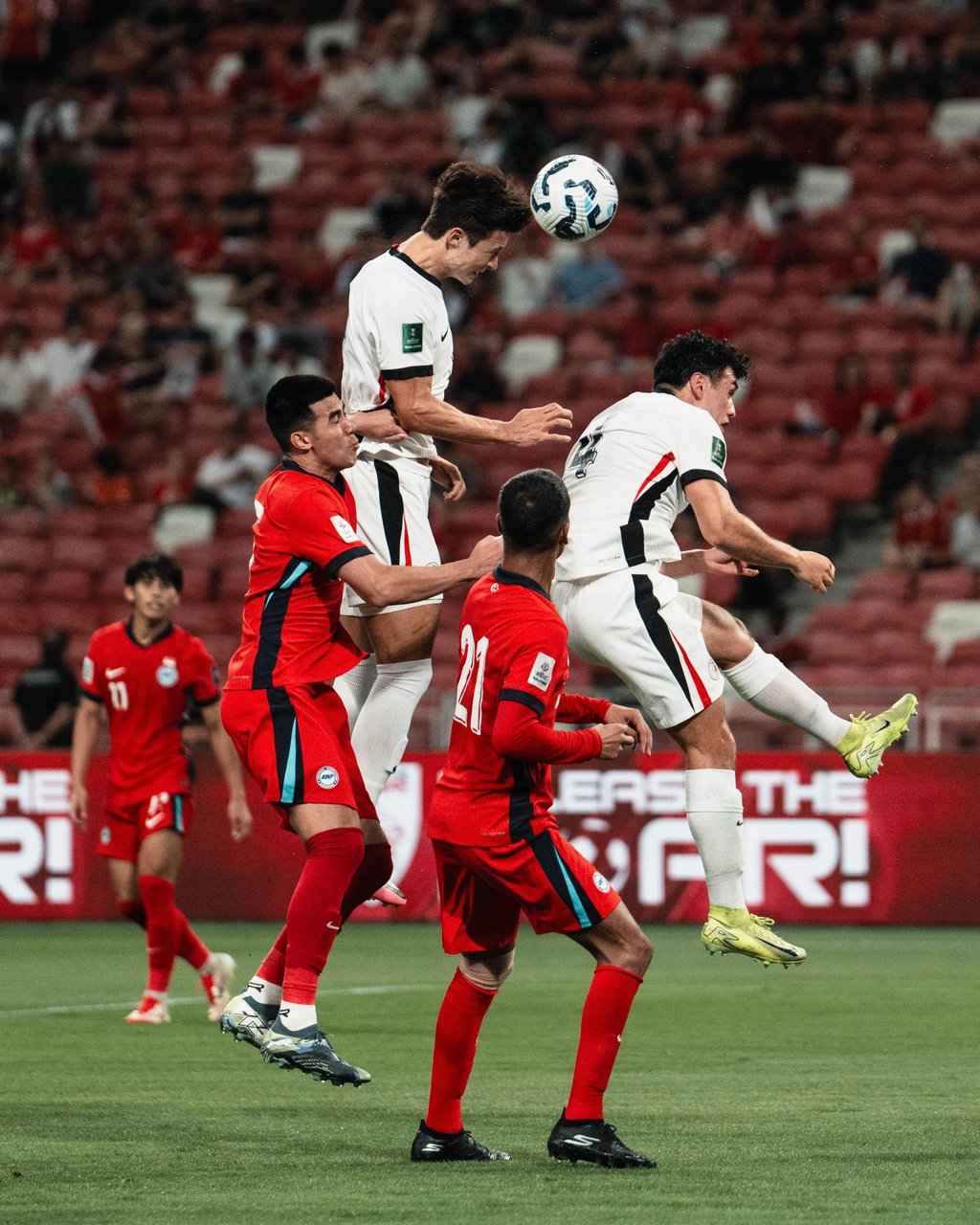 Matt Orr crashes a header against the bar in Singapore. Photo: HKFA Matt Orr crashes a header against the bar in Singapore. Photo: HKFA
