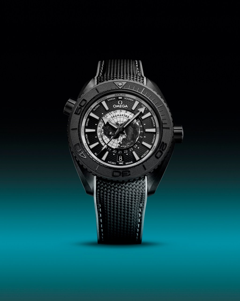 The monochrome version of Omega’s Seamaster Planet Ocean Worldtimer features grey varnish and new, light grey Super-LumiNova on the hands and indices. Photo: Handout