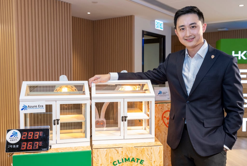 Azure Era managing director Rick Li stands next to a model of the company’s radiative cooling technology.