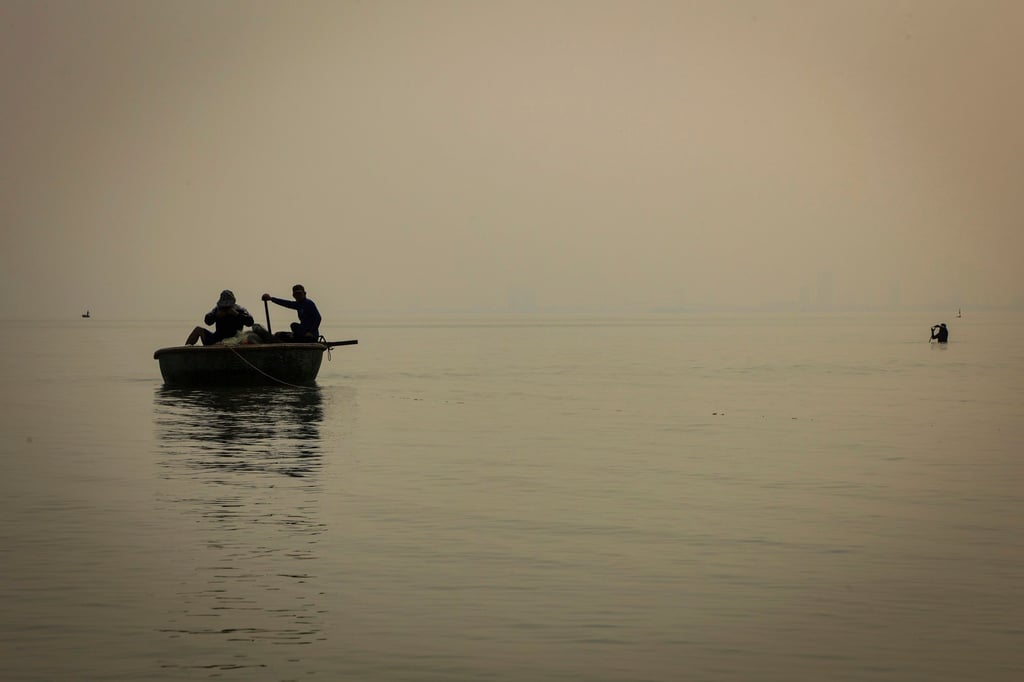 Fishermen in the waters off Nam O, Da Nang. Photo: Fishermen in the waters off Nam O, Da Nang. Photo: