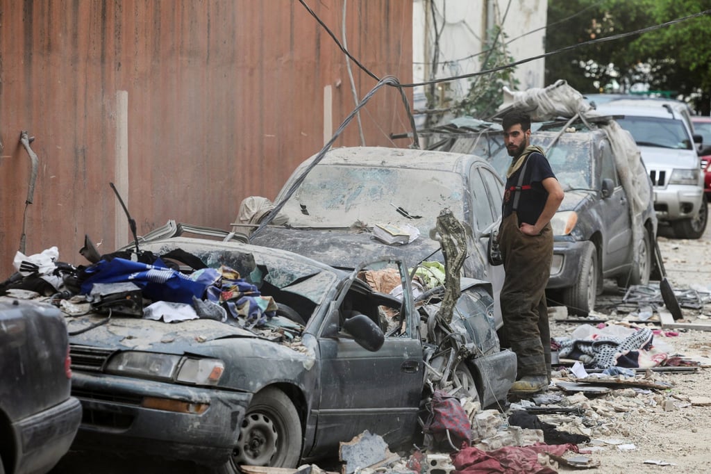 Damaged vehicles in the aftermath of the Israeli air strike. Photo: Reuters