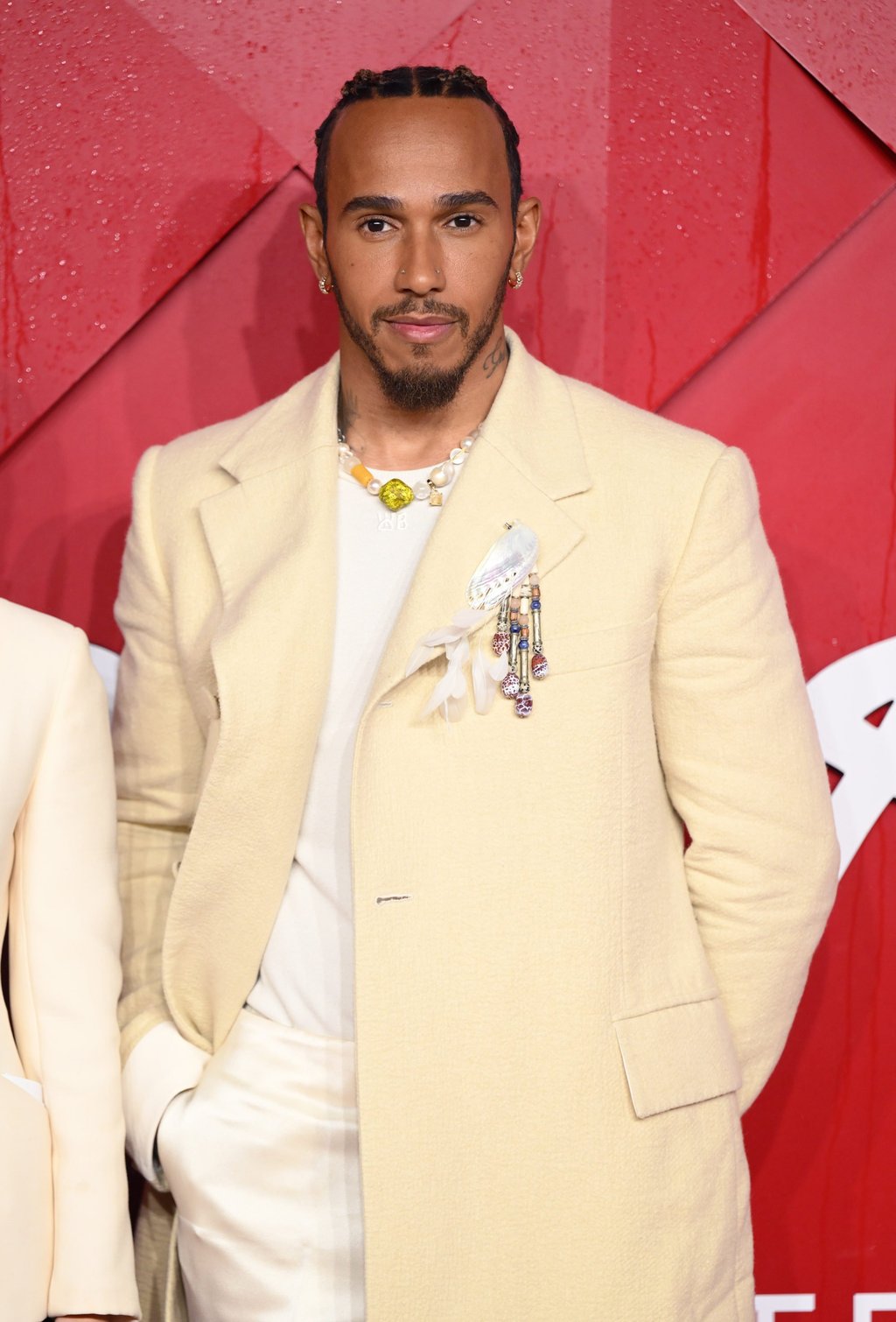 Lewis Hamilton was a pioneer of lively lapel action. He’s pictured here at The Fashion Awards 2023, held at the Royal Albert Hall in London. Photo: WireImage