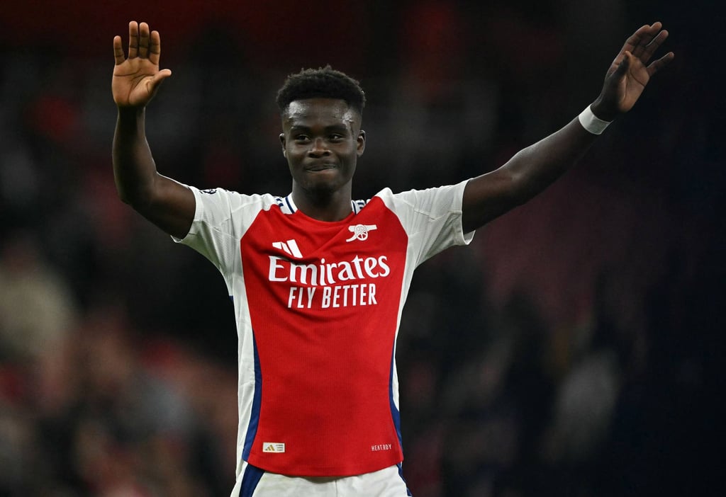 Arsenal’s Bukayo Saka applauds the fans after his sides win over Fulham. Photo: AFP Arsenal’s Bukayo Saka applauds the fans after his sides win over Fulham. Photo: AFP