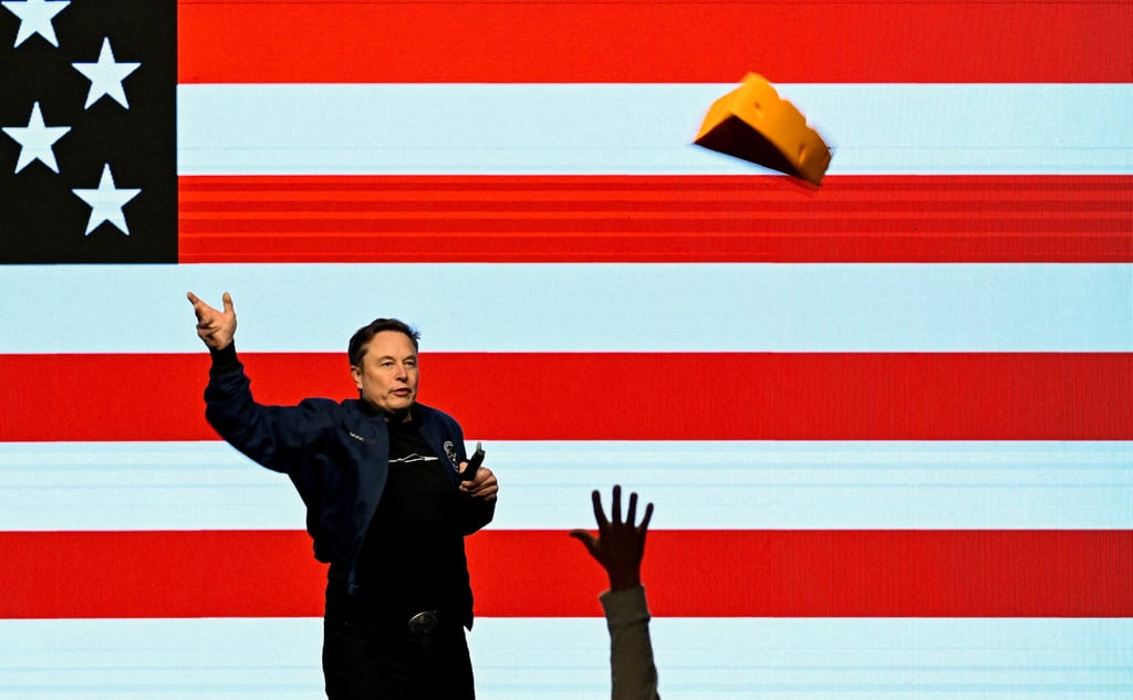 Elon Musk throws an autographed cheese hat at a rally in Green Bay, Wisconsin on Sunday in support of Brad Schimel. Photo: Reuters