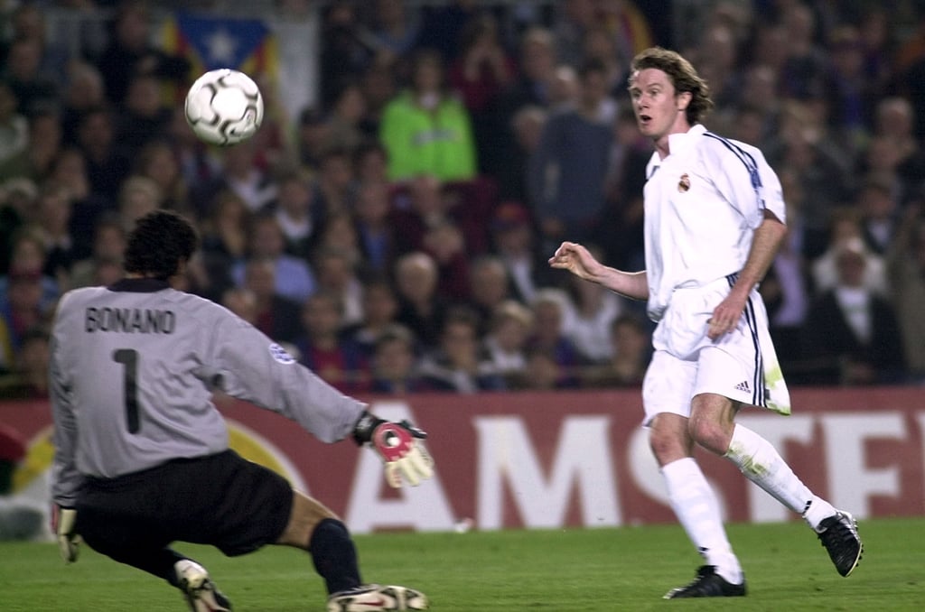 Steve McManaman scores for Real Madrid against Barcelona in the 2002 Champions League semi-final. Photo: AP