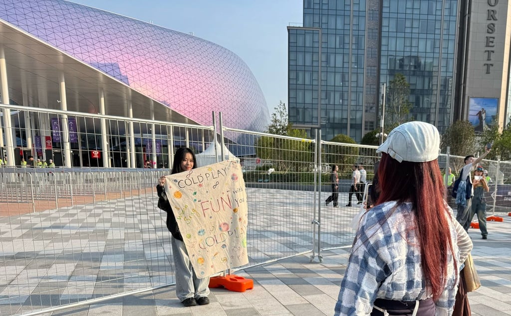 Qin Siqi poses outside Kai Tak Stadium. Photo: Lo Hoi-ying Qin Siqi poses outside Kai Tak Stadium. Photo: Lo Hoi-ying