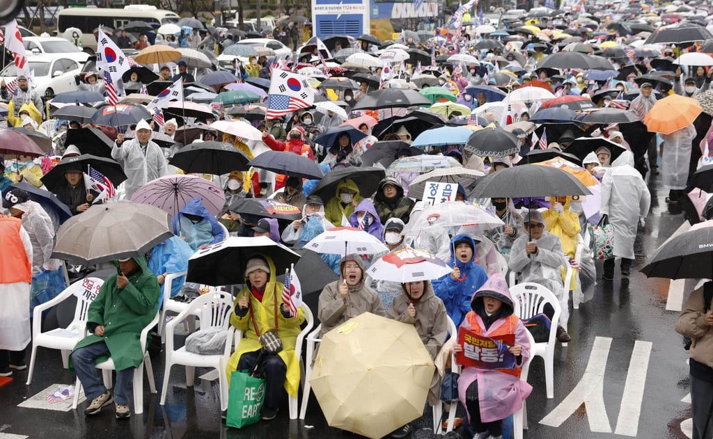 Supporters of former South Korean president Yoon Suk-yeol gather in Seoul on Saturday, a day after the Constitutional Court removed him from office over his December 3 martial law declaration. Photo: Kyodo