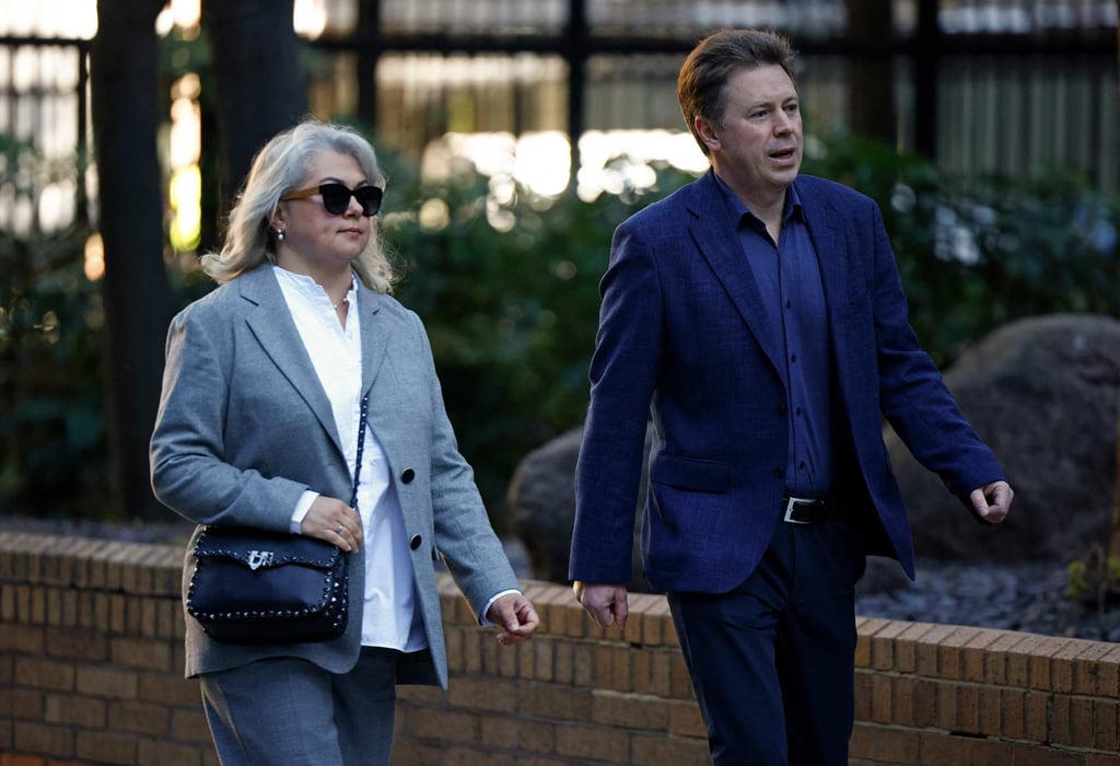 Former Russia government minister and former Mayor of Sevastopol, Dmitrii Ovsiannikov, and his wife Ekaterina Ovsiannikova arrive at court in London on Monday. Photo: AFP Former Russia government minister and former Mayor of Sevastopol, Dmitrii Ovsiannikov, and his wife Ekaterina Ovsiannikova arrive at court in London on Monday. Photo: AFP