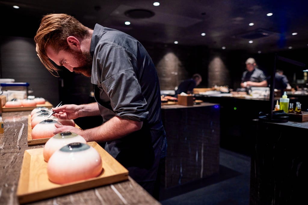 Chef Gregor Power plates the 1984 ‘impression’ at Alchemist. Photo: courtesy Alchemist