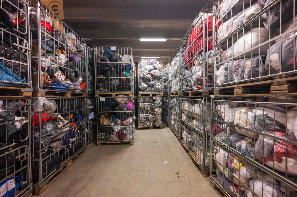 Artikel2’s sorting centre in Stockholm is overflowing with clothes. Photo: AFP Artikel2’s sorting centre in Stockholm is overflowing with clothes. Photo: AFP