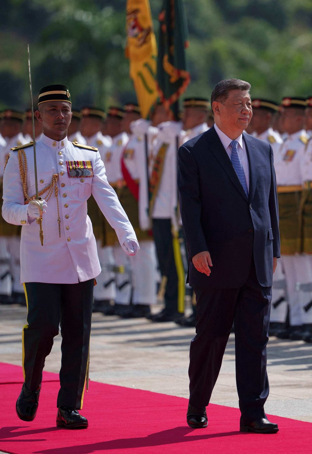 Chinese President Xi Jinping inspects a guard of honour during a welcome ceremony at the national palace in Kuala Lumpur on Wednesday. Photo: AFP Chinese President Xi Jinping inspects a guard of honour during a welcome ceremony at the national palace in Kuala Lumpur on Wednesday. Photo: AFP