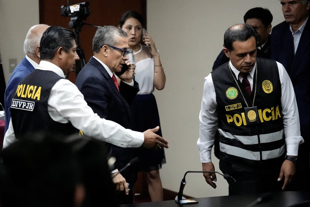 Peru’s former President Ollanta Humala is escorted by the police after hearing the sentence of 15 years, at the court in Lima, Peru on Tuesday. Photo: Reuters