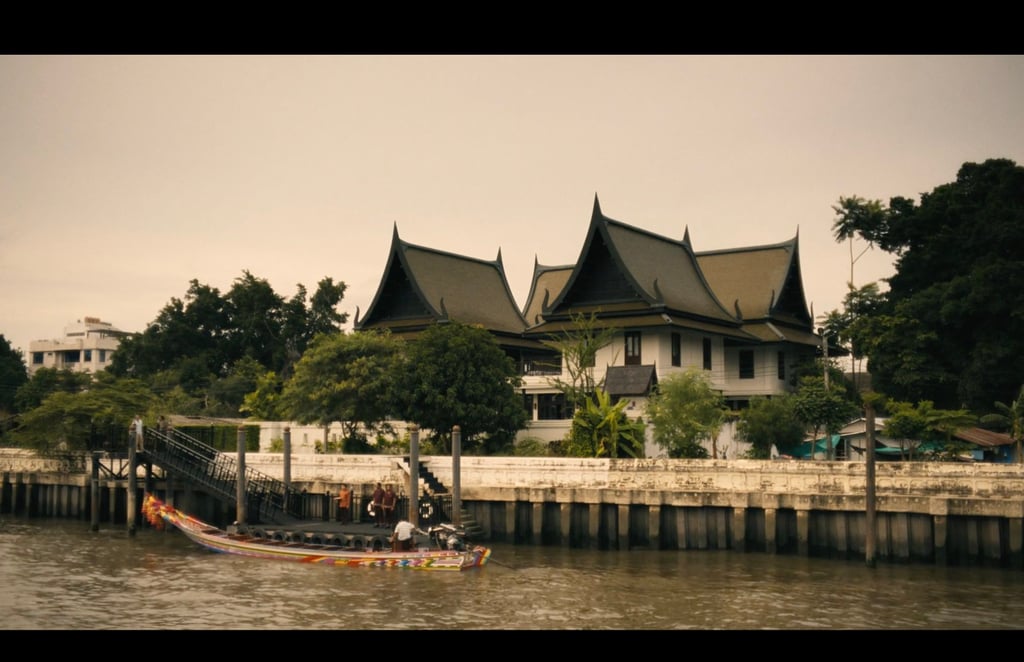 A long-tail boat carrying Walton Goggins (Rick) and Sam Rockwell (Frank) arrives at Siri Sala, which doubles as the Bangkok home of The White Lotus resort’s owners, in episode seven. Photo: HBO A long-tail boat carrying Walton Goggins (Rick) and Sam Rockwell (Frank) arrives at Siri Sala, which doubles as the Bangkok home of The White Lotus resort’s owners, in episode seven. Photo: HBO
