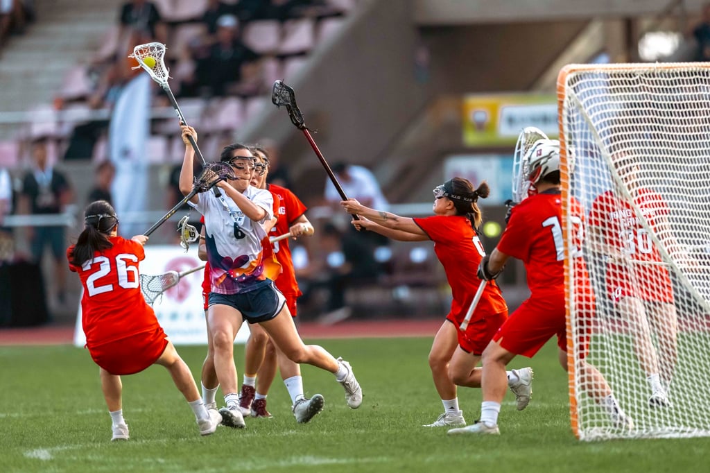 SELL’s Chisa Kobayashi (white) was a menace with five goals in the final. Photo: Hong Kong Lacrosse Open SELL’s Chisa Kobayashi (white) was a menace with five goals in the final. Photo: Hong Kong Lacrosse Open
