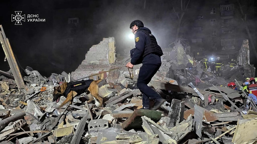 Rescuers work at the site of a Russian missile attack in Kyiv on Thursday. Photo: State Emergency Service of Ukraine/Agence France-Presse Rescuers work at the site of a Russian missile attack in Kyiv on Thursday. Photo: State Emergency Service of Ukraine/Agence France-Presse