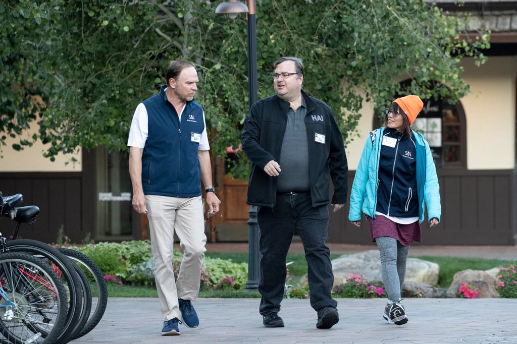 Shelby Bonnie (left), founder of Pylon AI, with Reid Hoffman, co-founder and board chair of LinkedIn, and his wife Michelle Yee, in 2019, in Sun Valley, Idaho. Photo: Getty Images