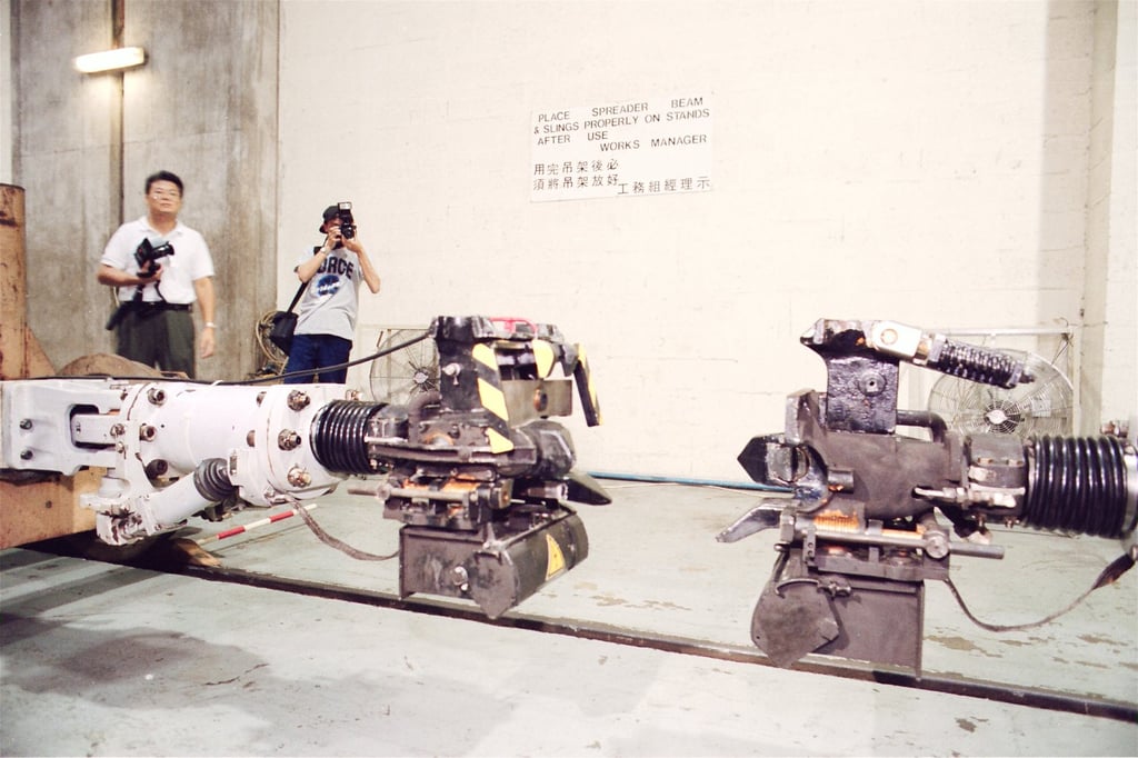 Pictured here is the new yellow and black fail-safe locking device installed after the incident that was designed to trigger the emergency brake in case of de-couplings. Photo: SCMP Archives