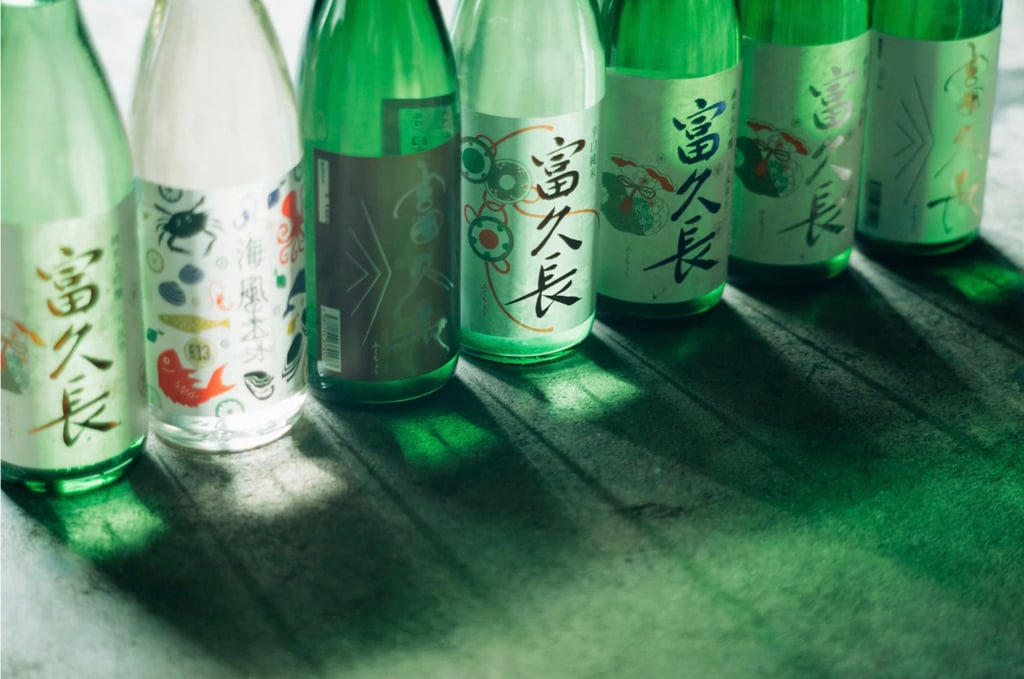 Imada Shuzoโs Seafood Junmai sake (second from left) among other varieties from the sake brewer. Photo: Imada Shuzo Imada Shuzoโs Seafood Junmai sake (second from left) among other varieties from the sake brewer. Photo: Imada Shuzo