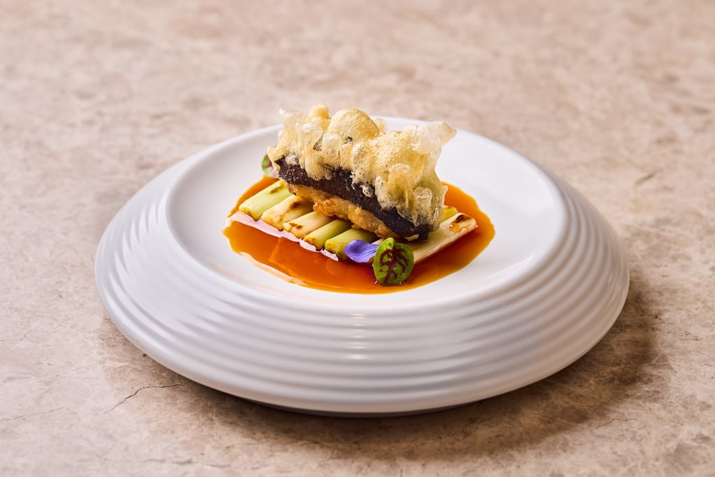 Crispy sea cucumber stuffed with shrimp mousse and pork at Ying Jee Club. Photo: Ying Jee Club Crispy sea cucumber stuffed with shrimp mousse and pork at Ying Jee Club. Photo: Ying Jee Club