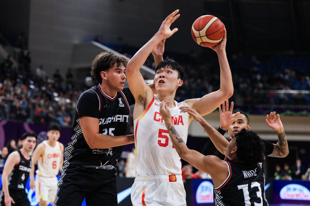 Yang Hansen goes for a lay-up during China’s game against Guam in the first round of the Fiba Asia Cup 2025 Qualifiers. Photo: Getty Images