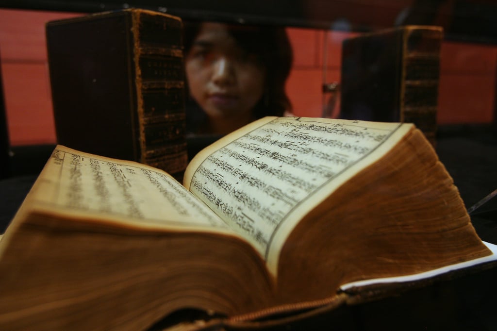 One of the first Chinese-language bibles to be translated in 1823 featured in an exhibition organised by Hong Kong Bible Society to celebrate the 200th anniversary of the arrival of Protestant missionary Robert Morrison in China. Photo: SCMP Archives One of the first Chinese-language bibles to be translated in 1823 featured in an exhibition organised by Hong Kong Bible Society to celebrate the 200th anniversary of the arrival of Protestant missionary Robert Morrison in China. Photo: SCMP Archives