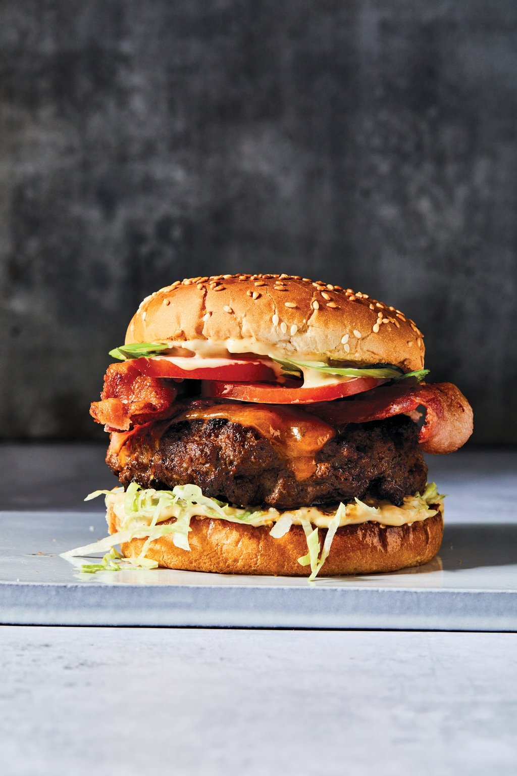 Peter Som’s mouthwatering char siu bacon burger. Photo: Handout