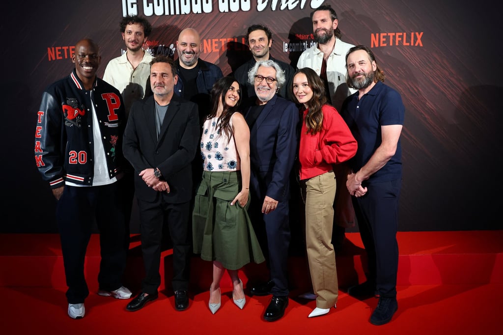Director Alain Chabat (white hair and glasses) with voice actors from the Netflix miniseries Asterix & Obelix: The Big Fight, in Paris. Photo: Reuters Director Alain Chabat (white hair and glasses) with voice actors from the Netflix miniseries Asterix & Obelix: The Big Fight, in Paris. Photo: Reuters
