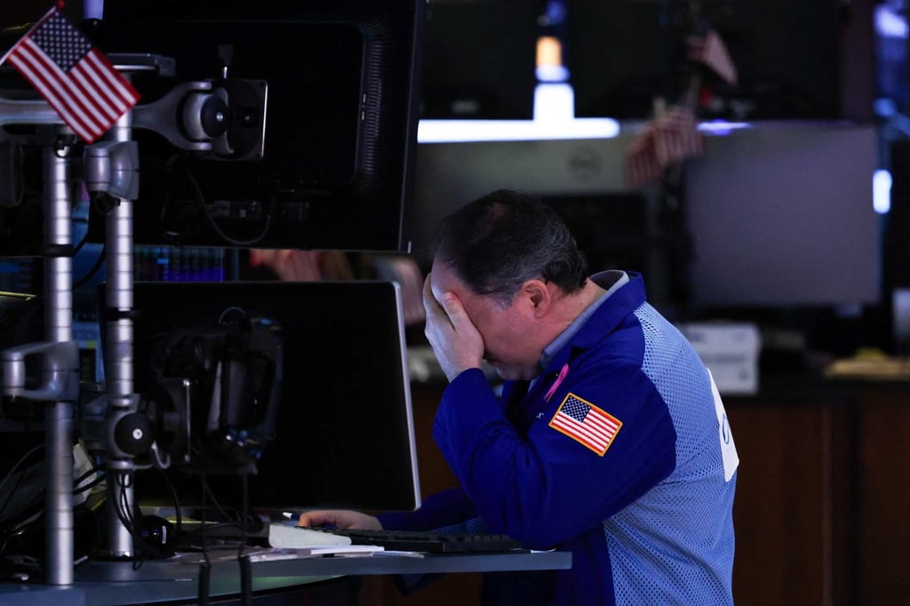 A trader on the floor of the New York Stock Exchange (NYSE) on April 16, 2025. Photo: AFP. A trader on the floor of the New York Stock Exchange (NYSE) on April 16, 2025. Photo: AFP.