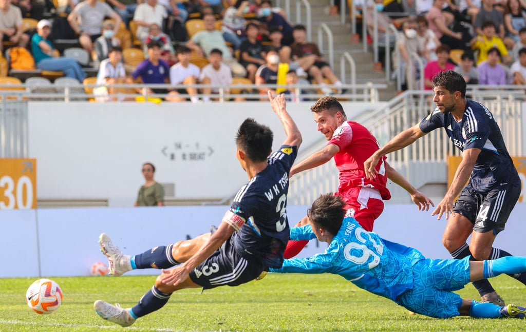 Stefan Pereira slides home one of his two goals in the 2023 Sapling Cup final. Photo: Yik Yeung-man
