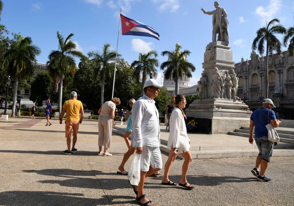 Tourists in downtown Havana, Cuba. Photo: Reuters Tourists in downtown Havana, Cuba. Photo: Reuters