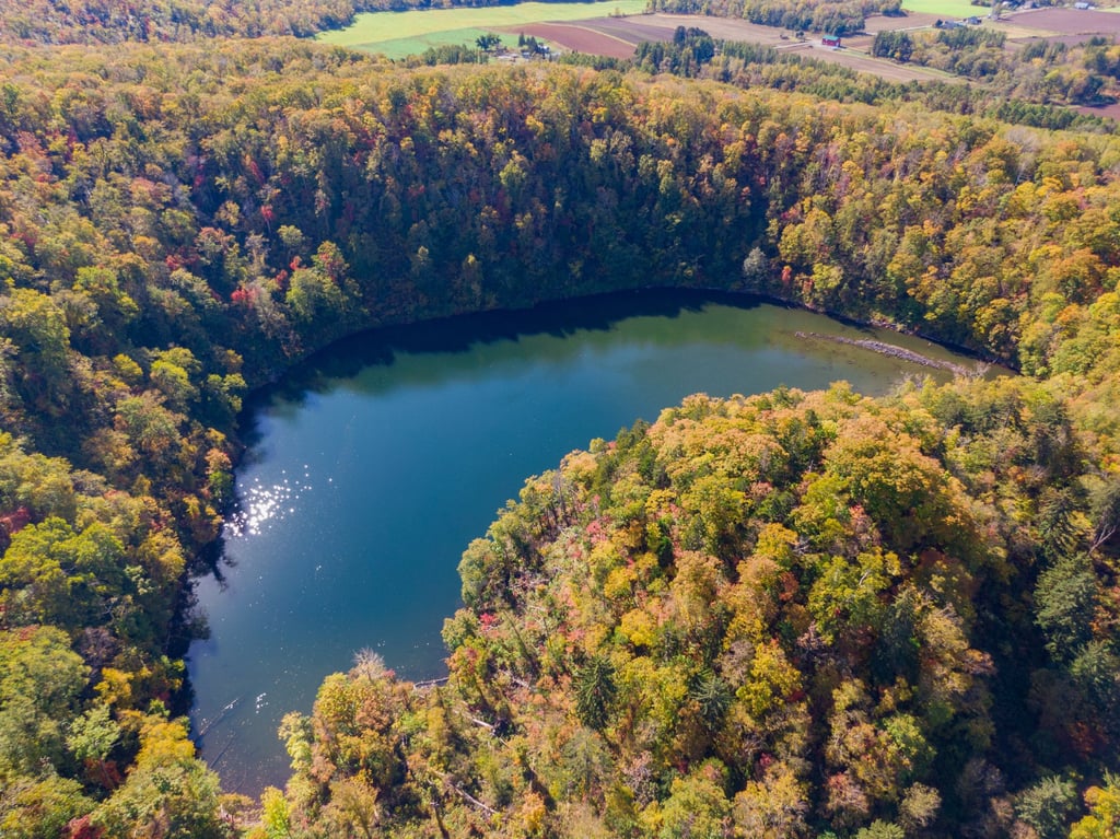 Visitors can swim in Lake Hangetsu in Niseko in summer, and walk on it’s frozen surface in snowshoes in the winter. Photo: Niseko Tourism