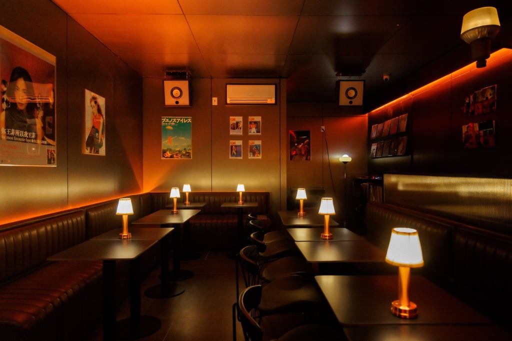 New York cocktail bar 929’s walls are decorated with posters of various Cantopop singers, and the soft, red lighting is reminiscent of scenes in Wong Kar-wai films. Photo: 929