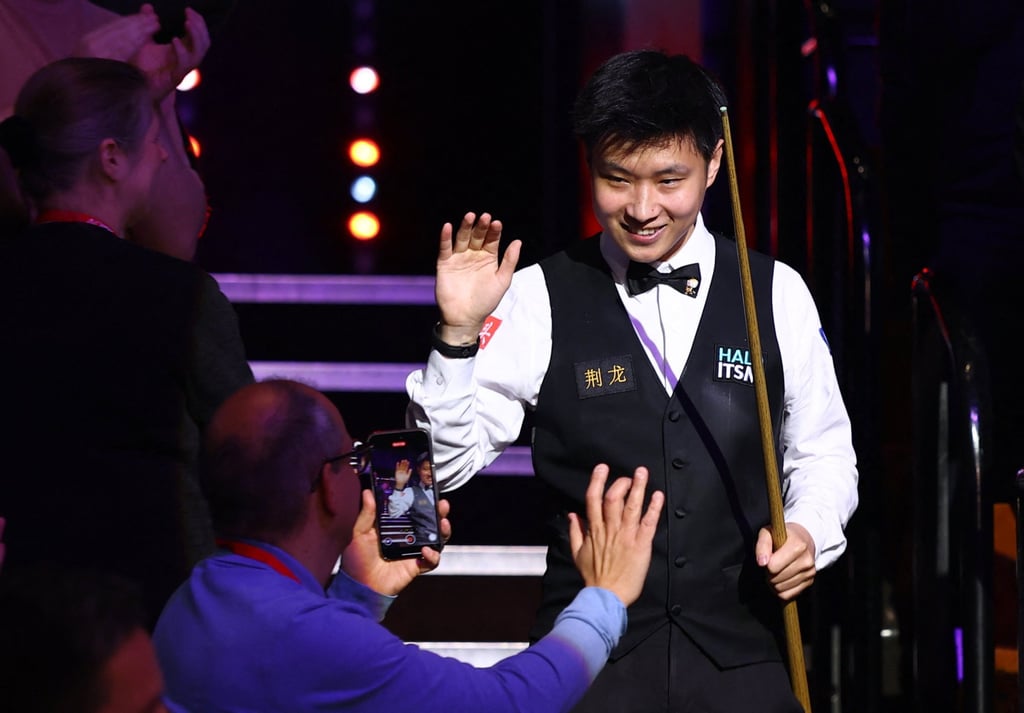 Zhao Xintong greets fans as he enters the Crucible for the final. Photo: Action Images via Reuters Zhao Xintong greets fans as he enters the Crucible for the final. Photo: Action Images via Reuters