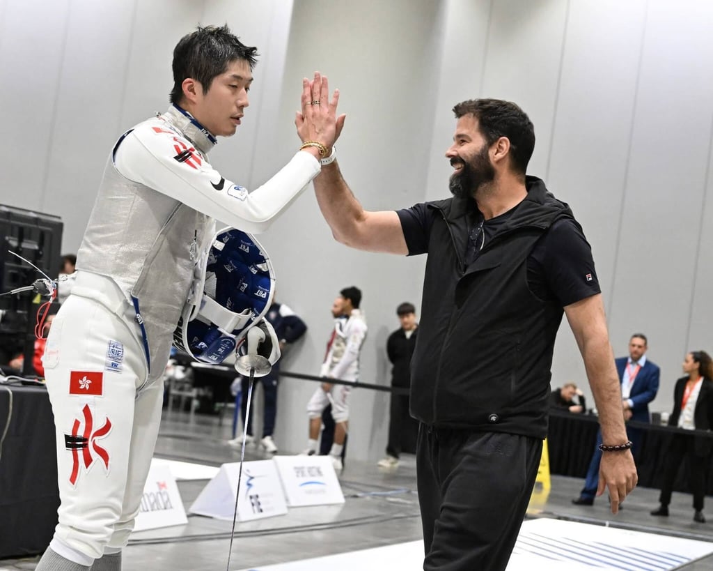 Cheung (left) with coach Greg Koenig after beating Italy’s Tommaso Martini in the round of 16. Photo: FIE Cheung (left) with coach Greg Koenig after beating Italy’s Tommaso Martini in the round of 16. Photo: FIE