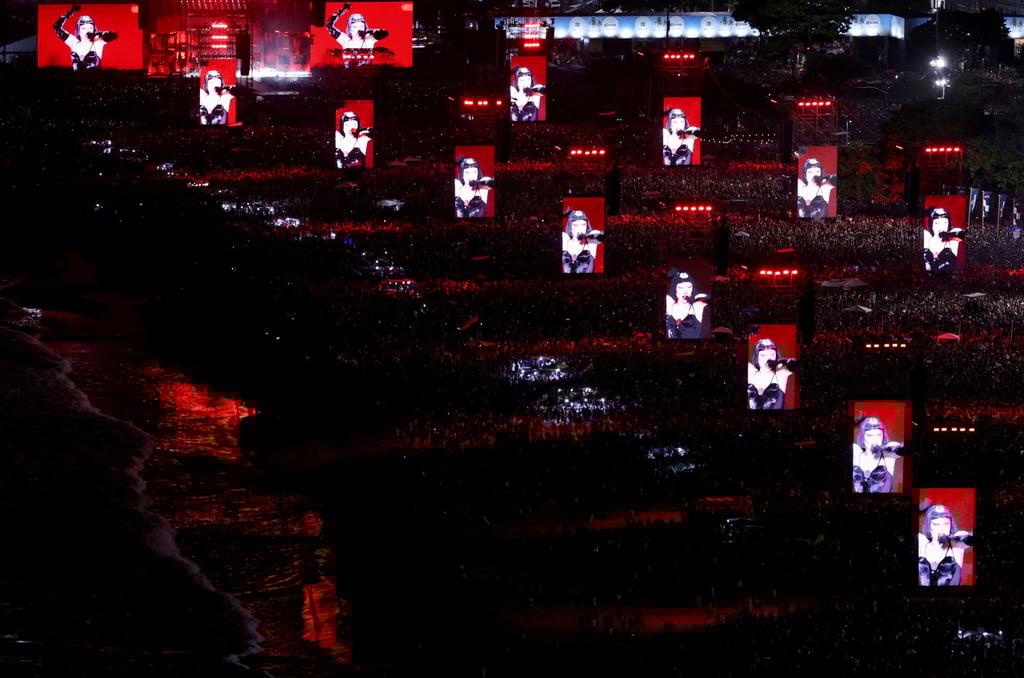 Displays show Lady Gaga performing on Saturday. Photo: Reuters Displays show Lady Gaga performing on Saturday. Photo: Reuters