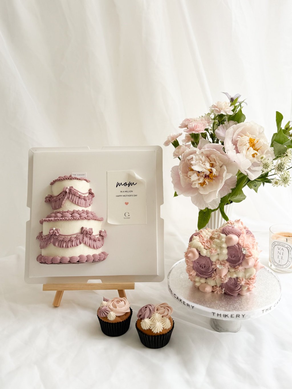 The Cakery’s collection showcases half-cakes that are presented like paintings on an easel. Photo: The Cakery