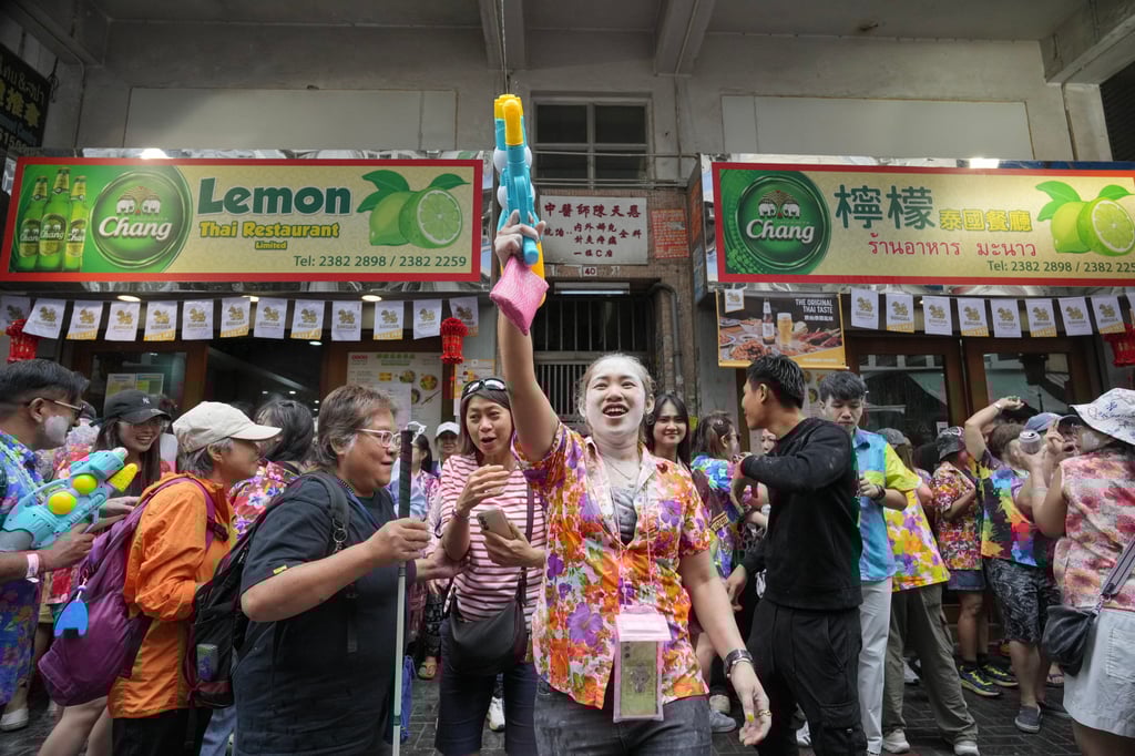 Participants spray water during the Songkran festival at South Wall Road in Kowloon City in 2025. South Wall Road is essentially Little Bangkok now. Photo: May Tse