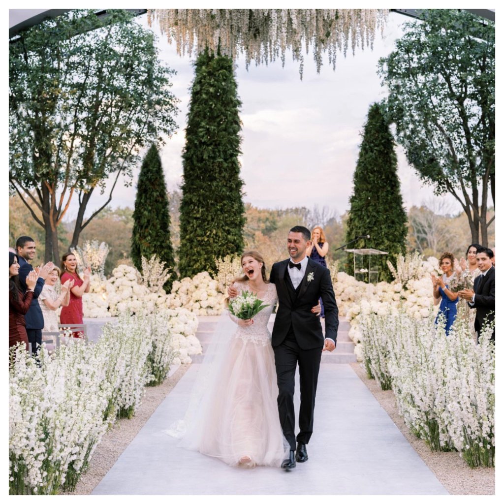 Jennifer Gates and Nayel Nassar walk down the aisle at their wedding, which was coordinated by Marcy Blum. Photo: @jenngatesnassar/Instagram