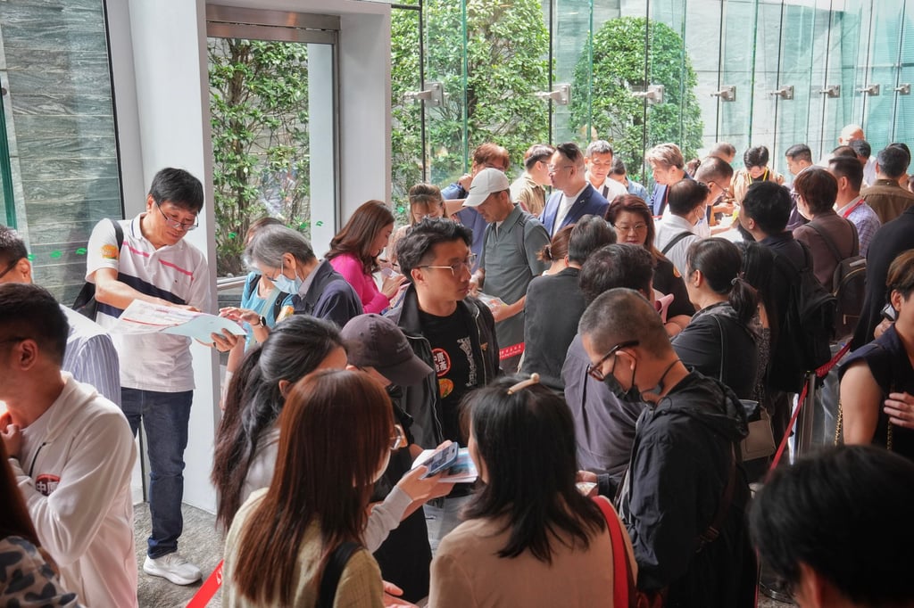 Potential buyers queue up to buy flats in Sun Hung Kai Properties’ Sierra Sea residential project at the International Commerce Centre on May 3. Photo: Elson Li Potential buyers queue up to buy flats in Sun Hung Kai Properties’ Sierra Sea residential project at the International Commerce Centre on May 3. Photo: Elson Li