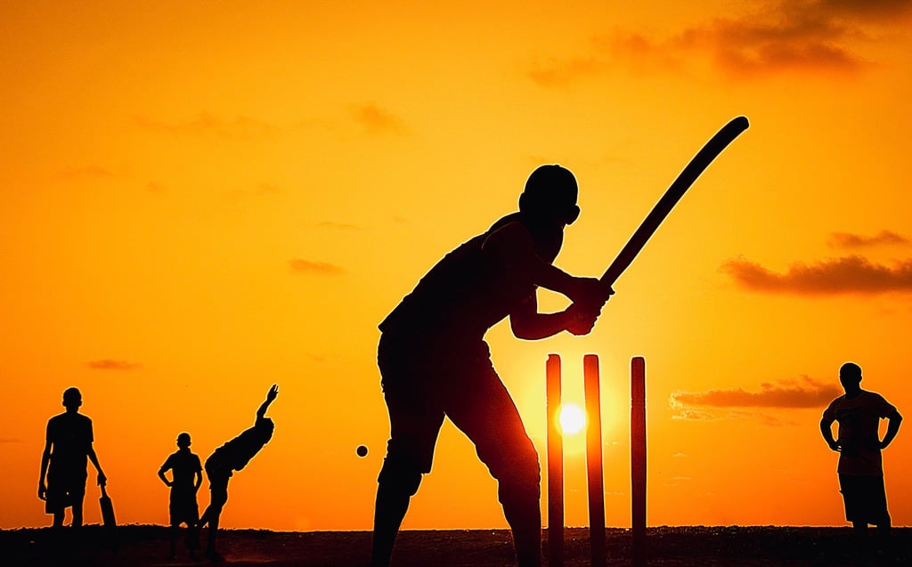 Bad light does not stop play at Sri Lanka’s Narigama beach, as these cricketers keep going while the sun goes down. Photo: Tim Pile Bad light does not stop play at Sri Lanka’s Narigama beach, as these cricketers keep going while the sun goes down. Photo: Tim Pile
