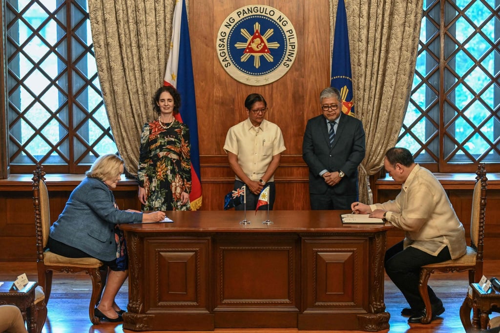 Philippine President Ferdinand Marcos Jnr (centre) looks on during the signing of the Status of Visiting Forces Agreement in Manila on April 30. Photo: AFP Philippine President Ferdinand Marcos Jnr (centre) looks on during the signing of the Status of Visiting Forces Agreement in Manila on April 30. Photo: AFP