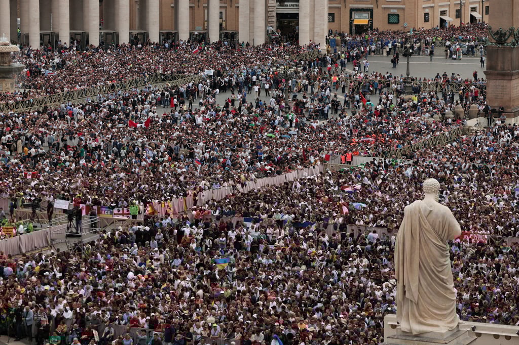 Faithful gather at the Vatican on Sunday. Photo: Reuters Faithful gather at the Vatican on Sunday. Photo: Reuters