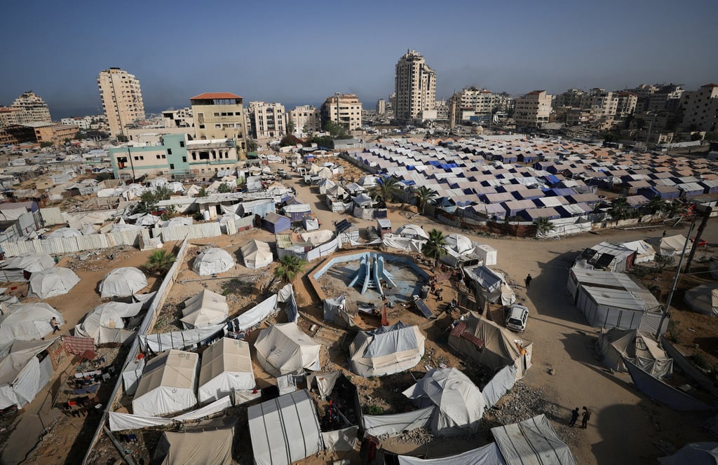 Palestinians displaced by the Israeli military offensive, shelter in tents in Gaza City. Photo: Reuters