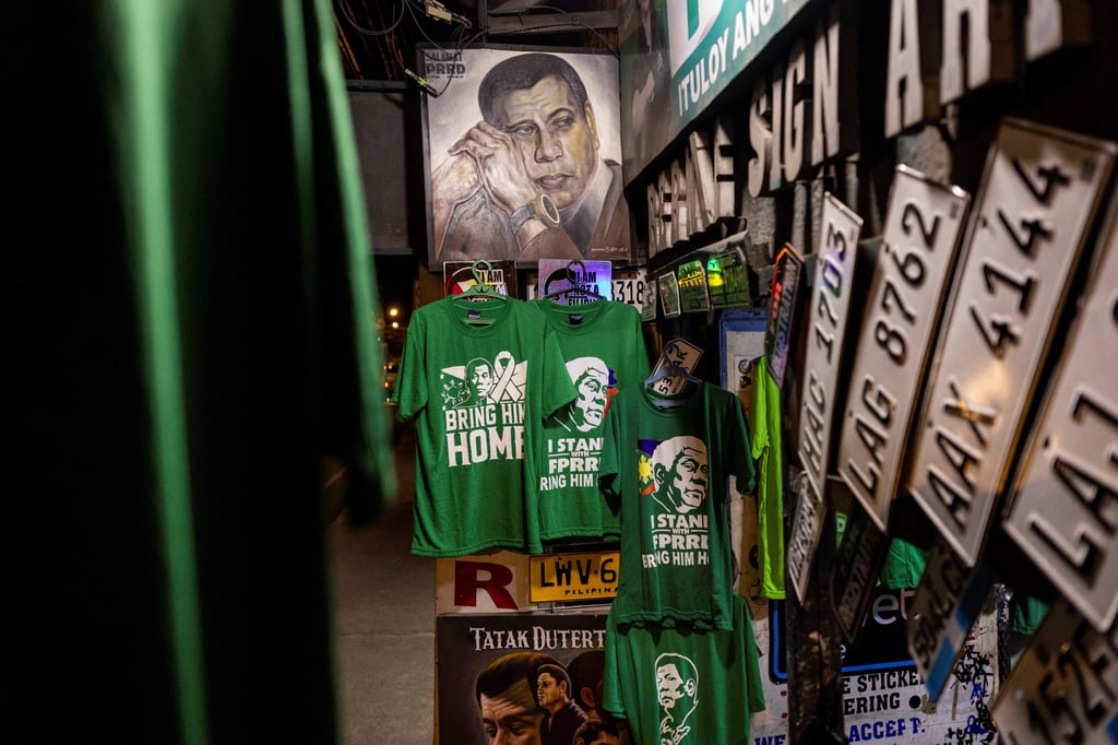 T-shirts with illustrations of former president Duterte are displayed for sale at a shop in Davao City. Photo: Reuters T-shirts with illustrations of former president Duterte are displayed for sale at a shop in Davao City. Photo: Reuters