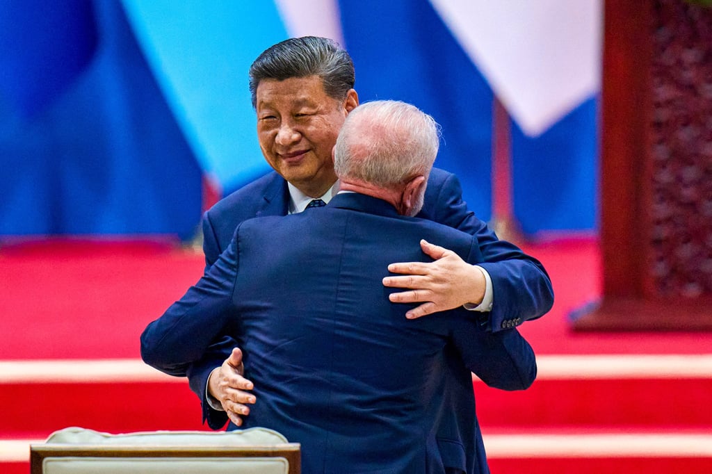 Chinese President Xi Jinping hugs Brazilian President Luiz Inacio Lula da Silva after delivering his opening speech at the fourth ministerial meeting of the Forum of China and Community of Latin American and Caribbean States in Beijing on Tuesday. Photo: AP Chinese President Xi Jinping hugs Brazilian President Luiz Inacio Lula da Silva after delivering his opening speech at the fourth ministerial meeting of the Forum of China and Community of Latin American and Caribbean States in Beijing on Tuesday. Photo: AP