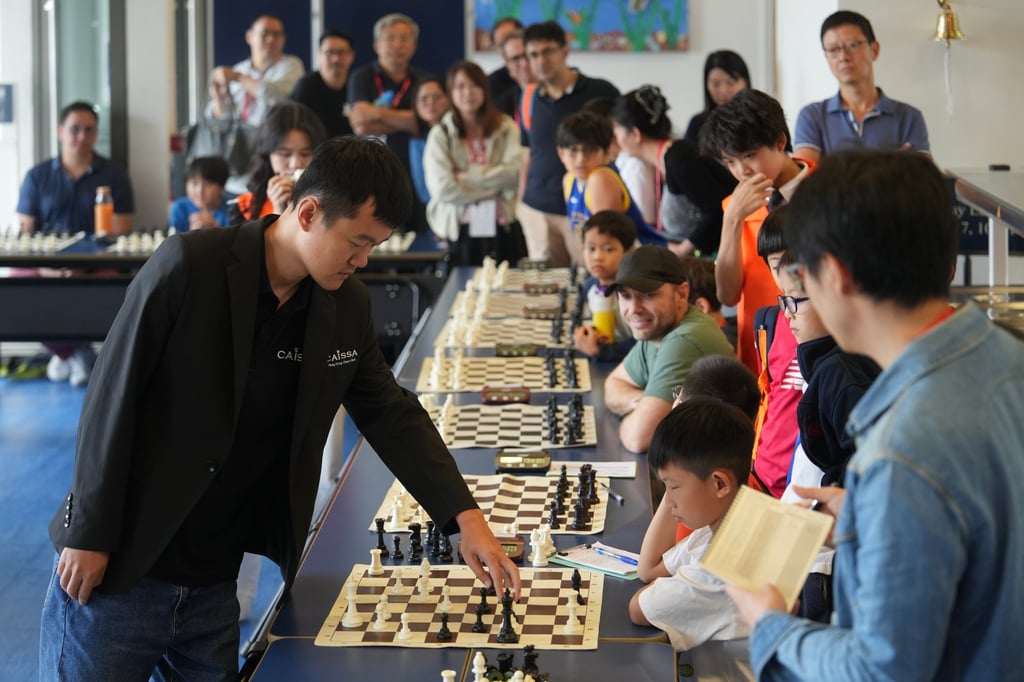 Ding Liren at the Harrow Hong Kong Scholastic Open Chess Tournament on Sunday. Photo: Sun Yeung Ding Liren at the Harrow Hong Kong Scholastic Open Chess Tournament on Sunday. Photo: Sun Yeung