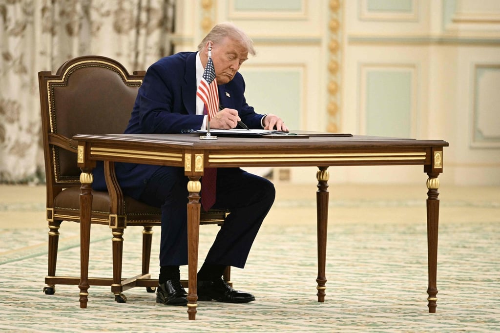 US President Donald Trump signs a document during a bilateral meeting with Saudi Crown Prince Mohammed bin Salman, in Riyadh on Tuesday. Photo: AFP US President Donald Trump signs a document during a bilateral meeting with Saudi Crown Prince Mohammed bin Salman, in Riyadh on Tuesday. Photo: AFP